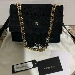 Versace womens handbag in black with gold hardware and Medusa
